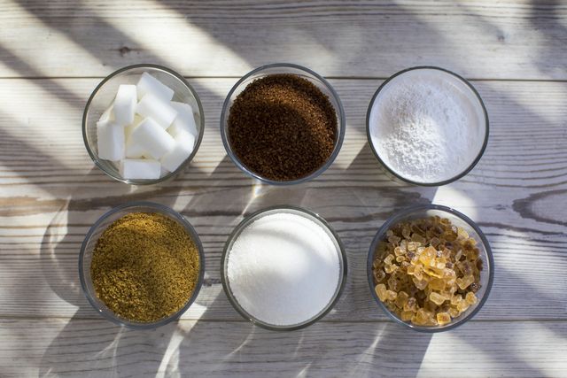 glasses of sugar in various forms, overhead view