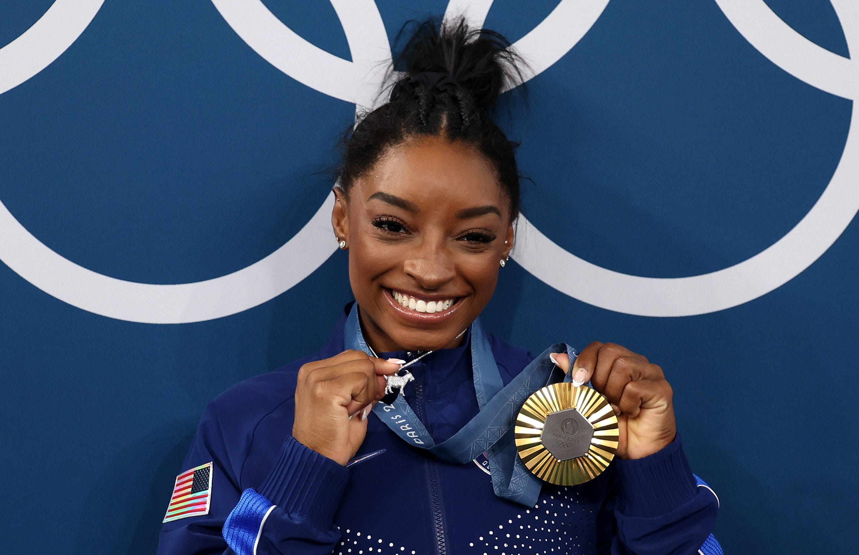 The Meaning Behind Simone Biles's Sparkly Goat Necklace Is Iconic