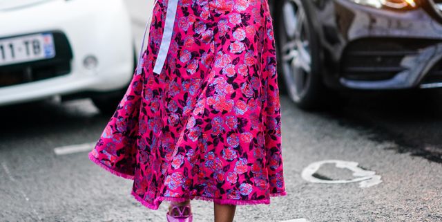 paris, france   march 01 actress naomi ackie wears a mauve shirt, a red and pink floral print skirt, pink pointy valentino shoes, outside valentino, during paris fashion week   womenswear fallwinter 20202021, on march 01, 2020 in paris, france photo by edward berthelotgetty images