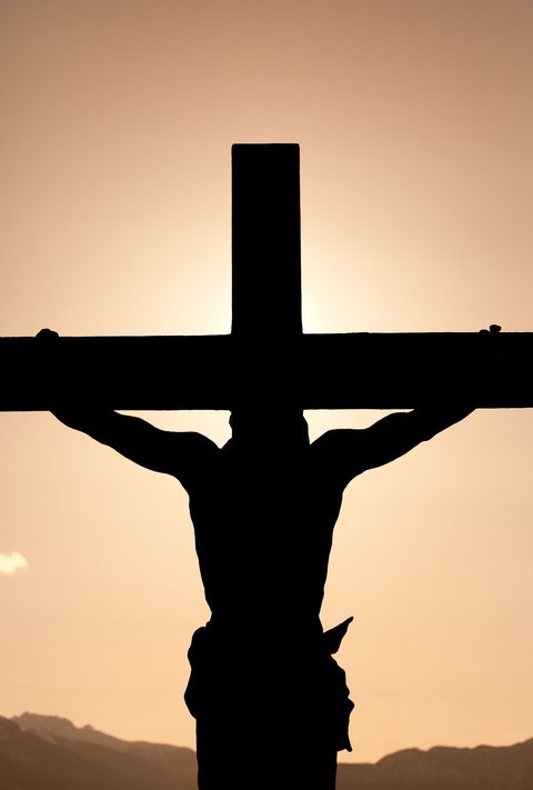 silhouette of jesus on cross