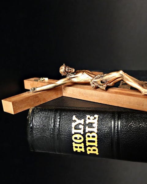 crucifix on top of bible crucifix on top of bible