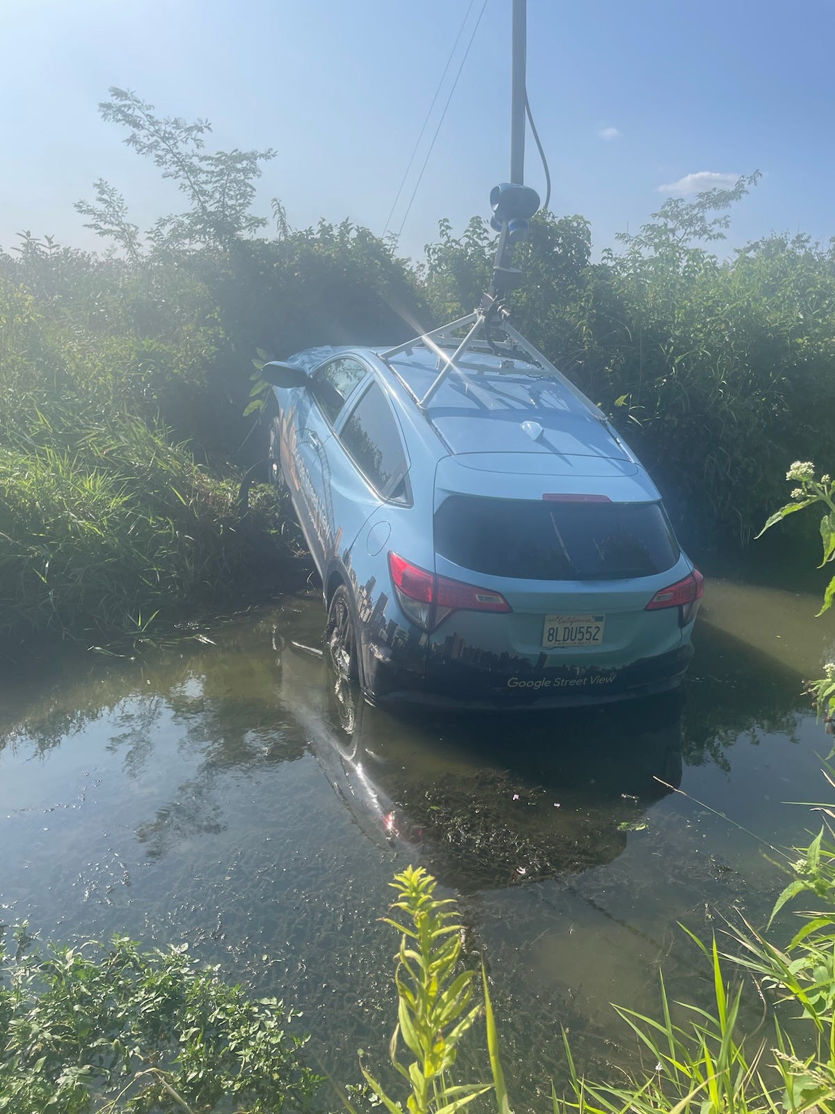 Google Street View Car Allegedly Leads Police on 100-MPH Chase Before Crashing Into Creek