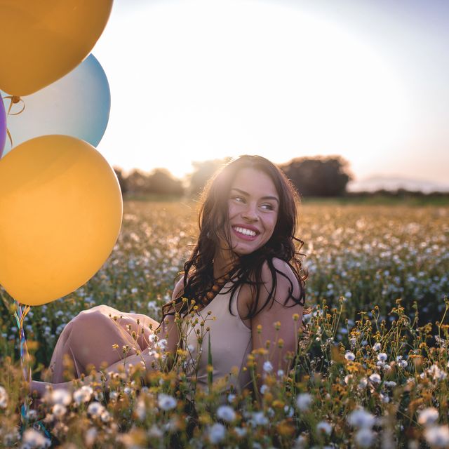 gorgeous girl with a couple of balloons