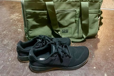 goruck ballistic training shoes next to a duffel bag