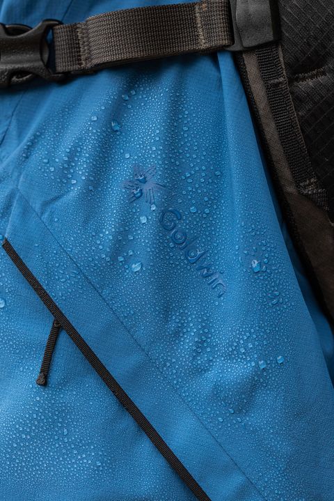 detail of the goldwin jacket with water beads on the surface