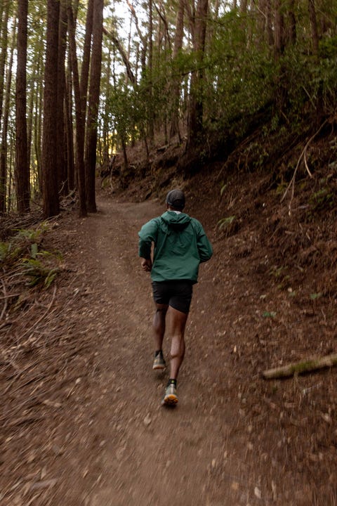 dezmond taylor douglas running up trail in forest