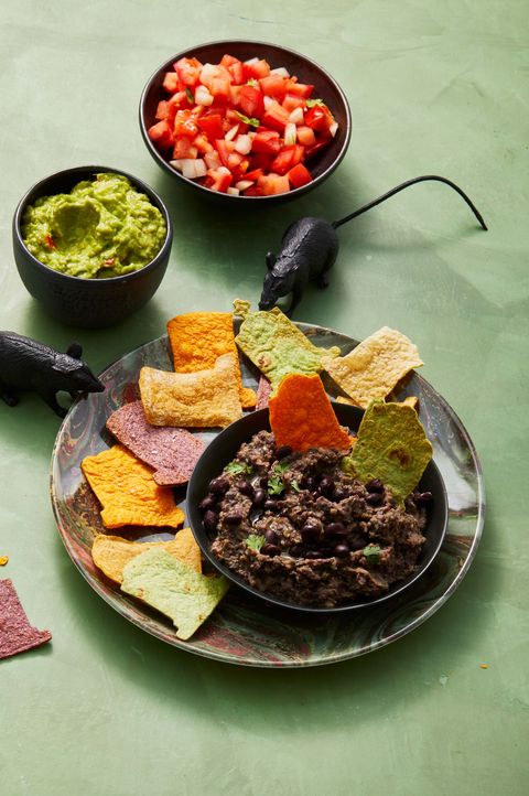 black bean dip with tortilla chips, guac and salsa
