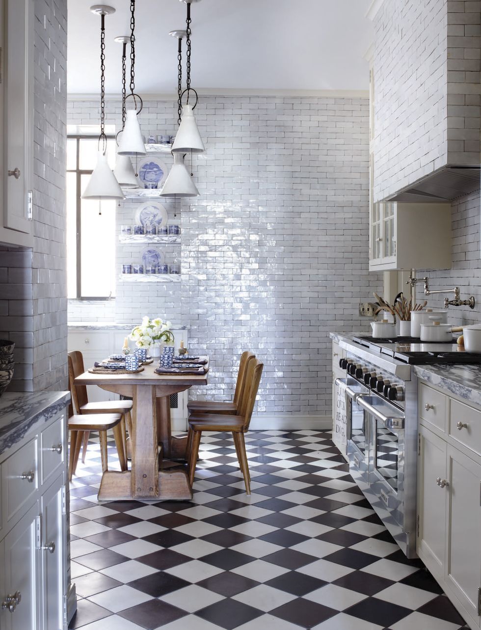 grey and white kitchen with grey floor