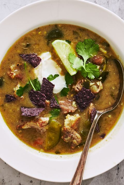 green chili pork stew topped with blue corn tortilla chips