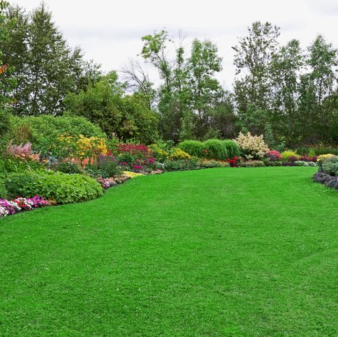 green-lawn-in-landscaped-formal-garden-royalty-free-image-157437387-1558025878.jpg
