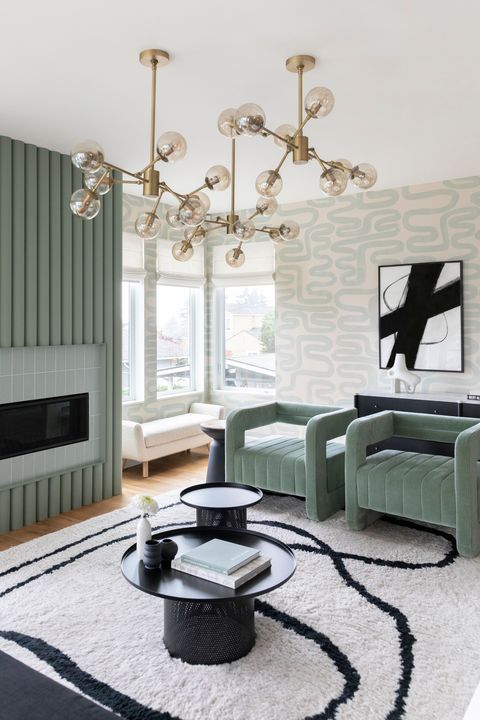 green fireplace with green armchairs