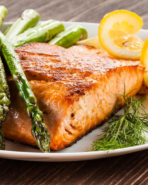 grilled salmon with french fries and asparagus