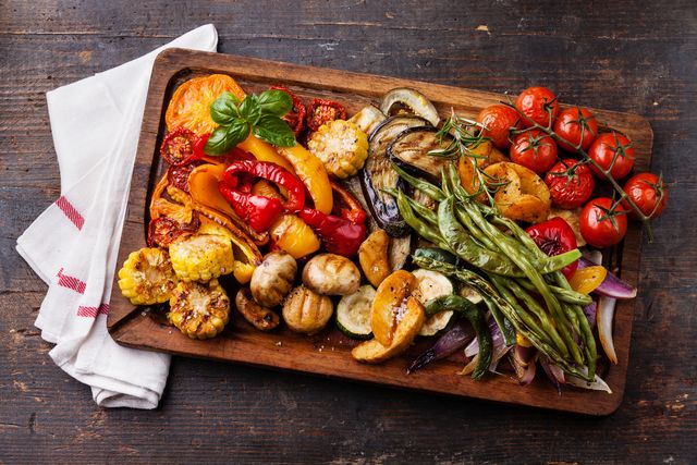 grilled vegetables on cutting board
