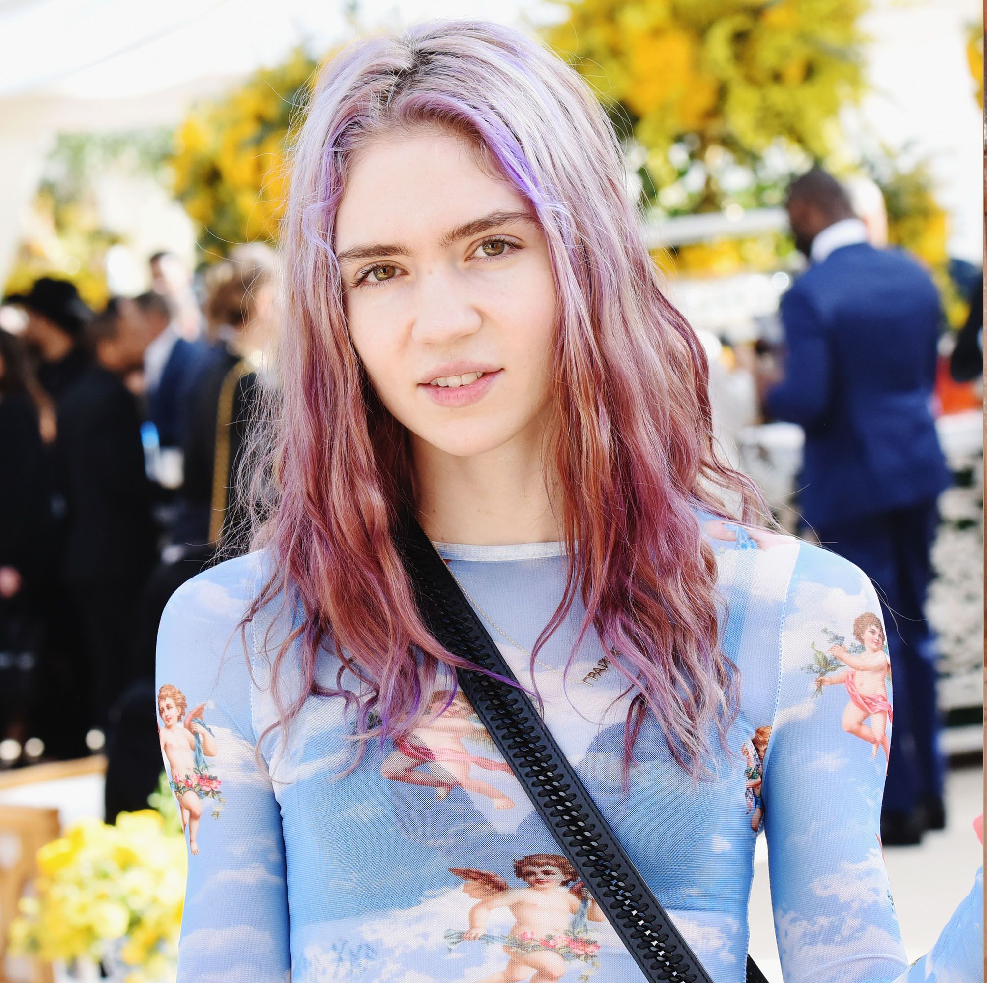 Grimes Is Reportedly Dating Whistleblower Chelsea Manning Following Split from Elon Musk