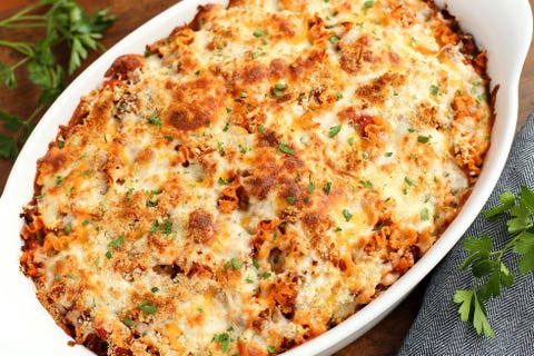 spicy lasagna hotdish in white casserole dish