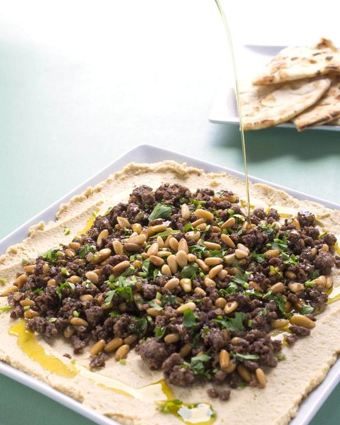 hummus with ground lamb and pine nuts
