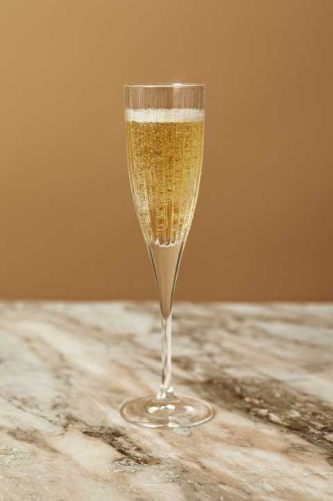Champagne cocktail, Drink, Champagne stemware, Glass, Alcoholic beverage, Water, French 75, Classic cocktail, Stemware, Cocktail, 