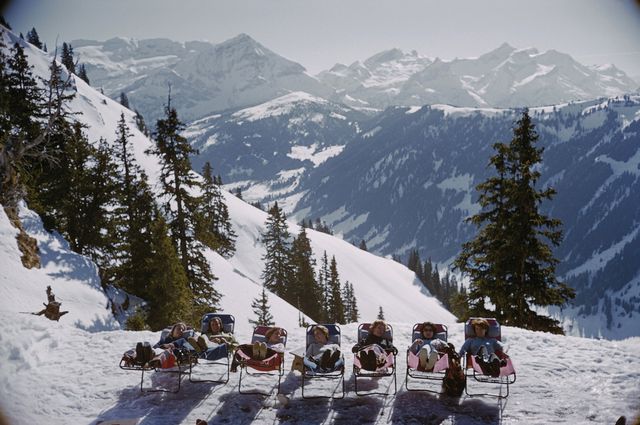 holidaymakers in sun loungers on the slopes at gstaad, switzerland, march 1961 1961  photo by slim aaronshulton archivegetty images