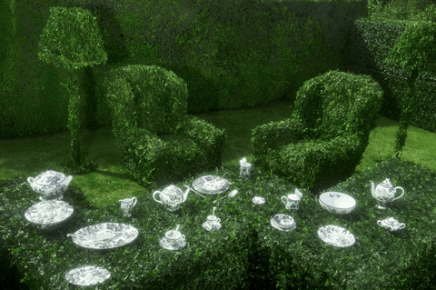 a collection of plates and teacups in a garden with topiaries shaped like trees and floor lamps