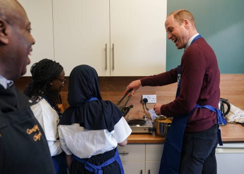 prince of wales,william visits together as one in slough pictured took part in a lesson with the charity‚Äôs global grub cooking programme