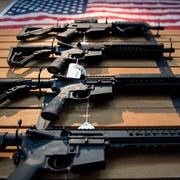 US-LIFESTYLE-WEAPONS assault rifles hang on the wall for sale at blue ridge arsenal in chantilly, virginia, on october 6, 2017 afp photo jim watson photo credit should read jim watsonafp via getty images
