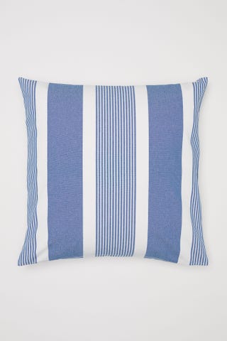 coussin à rayures blanches et bleues