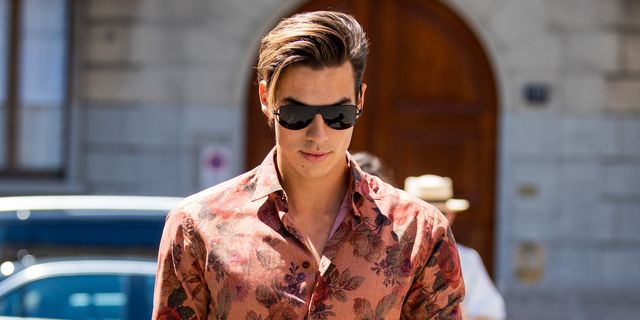 milan, italy   june 16 a guest is seen wearing button shirt with print outside etro during the milan mens fashion week springsummer 2020 on june 16, 2019 in milan, italy photo by christian vieriggetty images