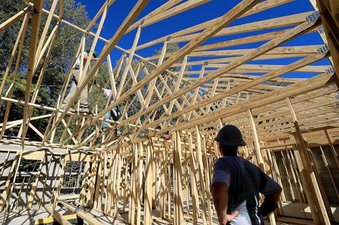 roof trusses are being installed on the Habitat for Humanity 3D printed house in Williamsburg on Wednesday, October 20, 2021