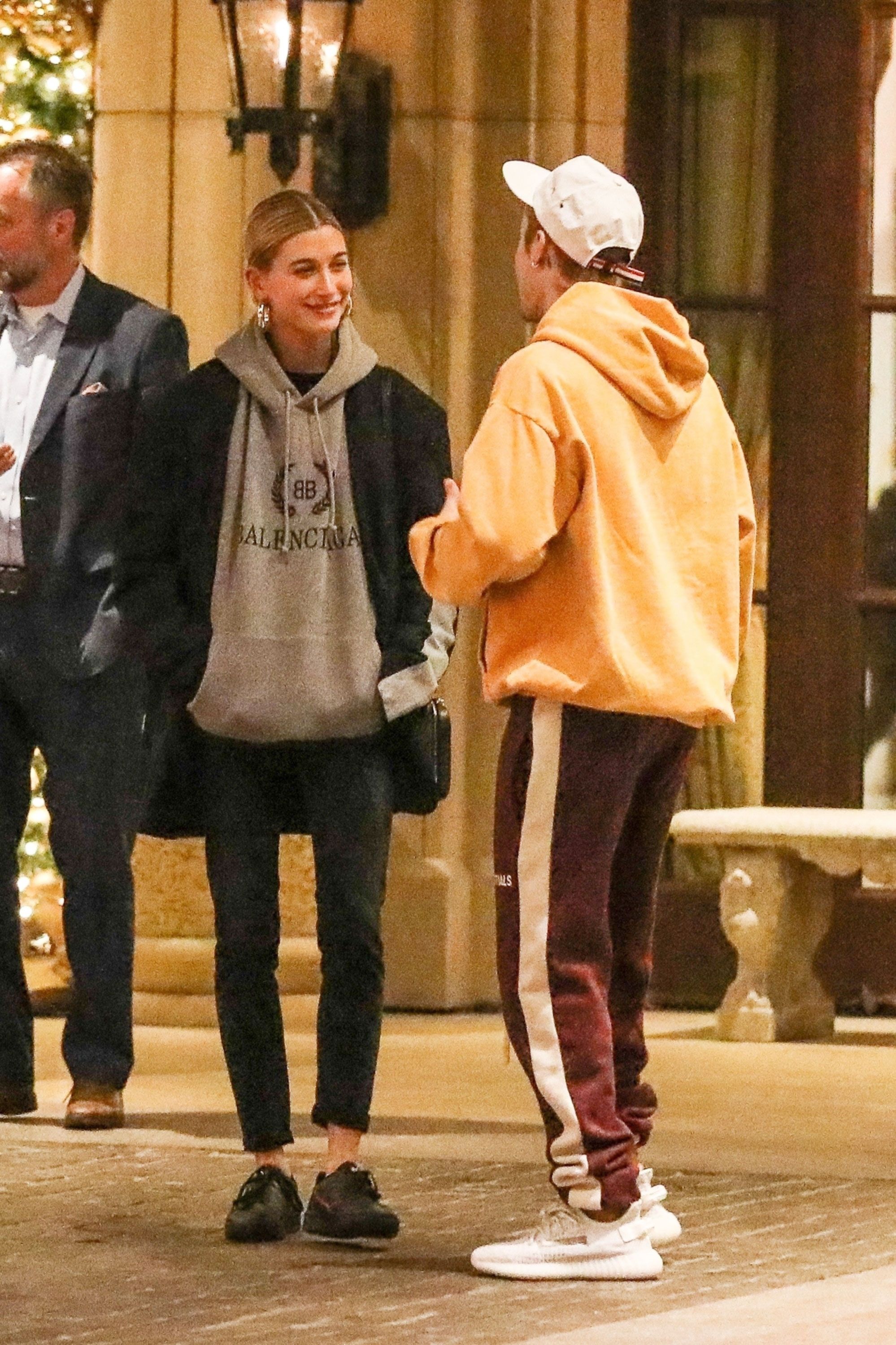 hailey baldwin orange sweater