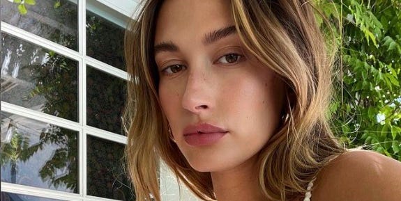 Hailey Bieber's platinum hair and blunt fringe pics are iconic Hailey Bieber's platinum hair and blunt fringe pics are iconic