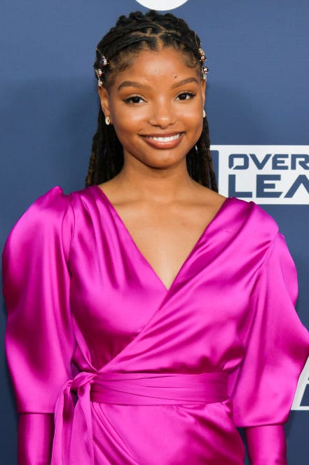 Halle Bailey halle bailey wears a pink dress on the red carpet