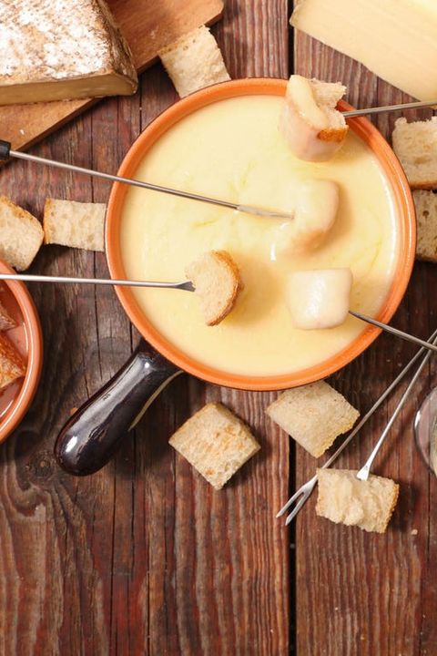 cheese fondue with bread skewers