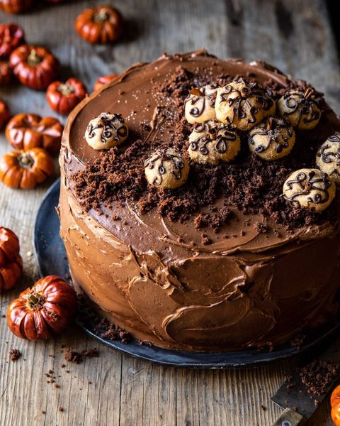 pumpkin patch chocolate peanut butter cake on wood surface