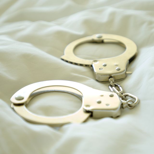 hand cuffs on bed
