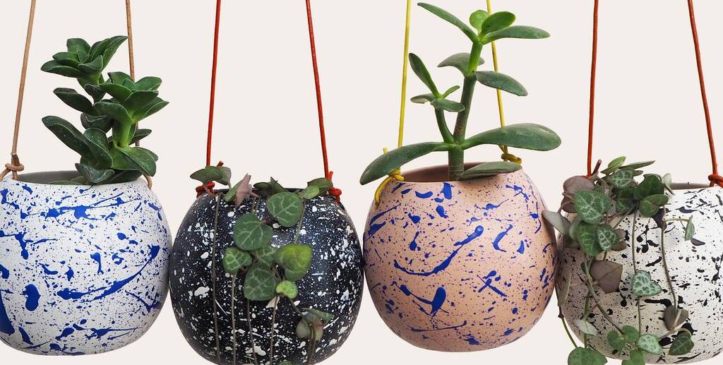 17 Best Hanging Plant Pots And Wall Planters For Indoor Spaces - White Ceramic Indoor Wall Planter