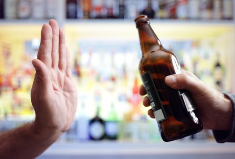 Hand rejecting alcoholic beer beverage Hand rejecting alcoholic beer beverage