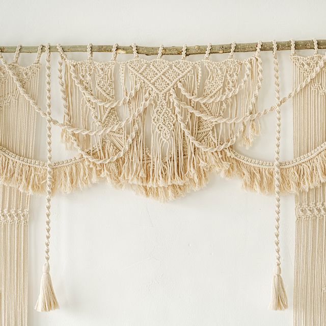 handmade macrame wedding arch on white wall cotton weaving boho style