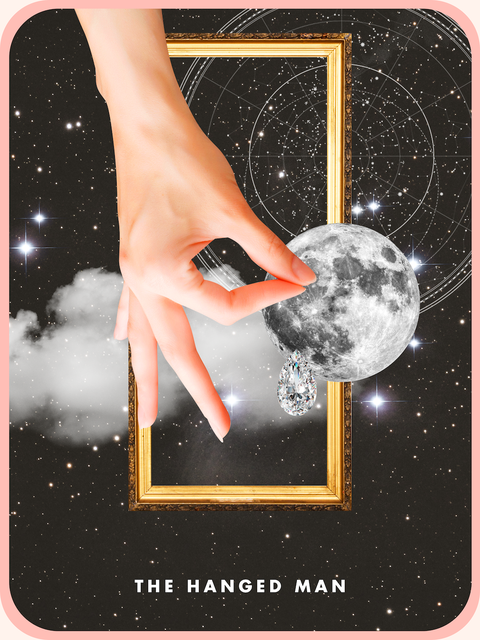 the hanged man tarot card, showing a hand reaching out to hold a full moon inside a golden picture frame