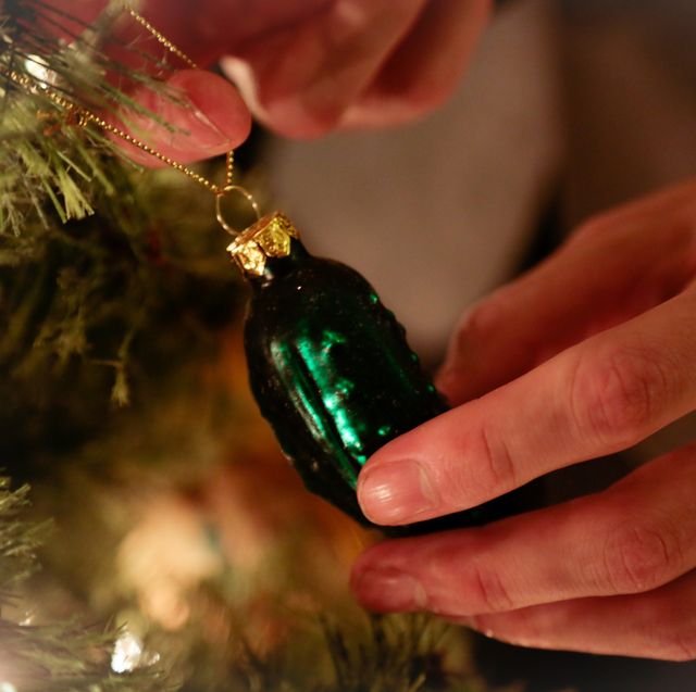 Hanging a Unique Ornament on the Christmas Tree