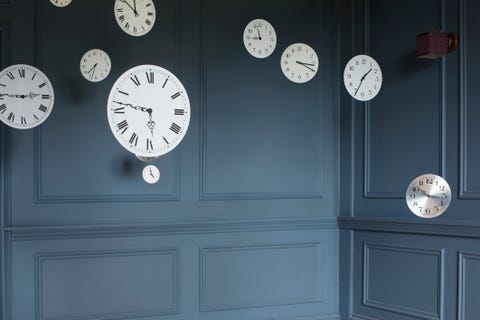 Hanging clocks in sitting room