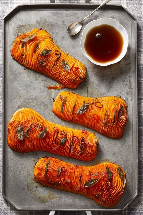 hasselback butternut squash with maple brown butter on gray pan