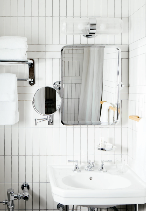 White, Bathroom, Room, Tile, Plumbing fixture, Interior design, Architecture, Floor, Material property, Black-and-white, 