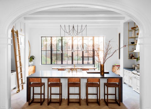 white kitchen, wooden chairs