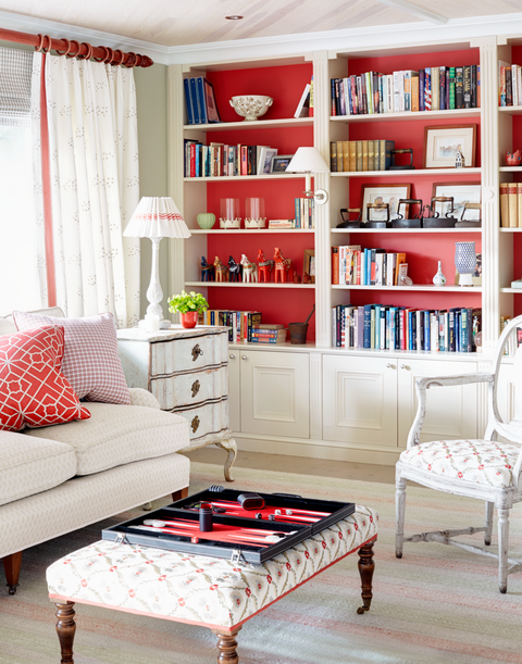 Furniture, Living room, Room, Red, Interior design, Shelf, Shelving, Bookcase, Home, Table, 