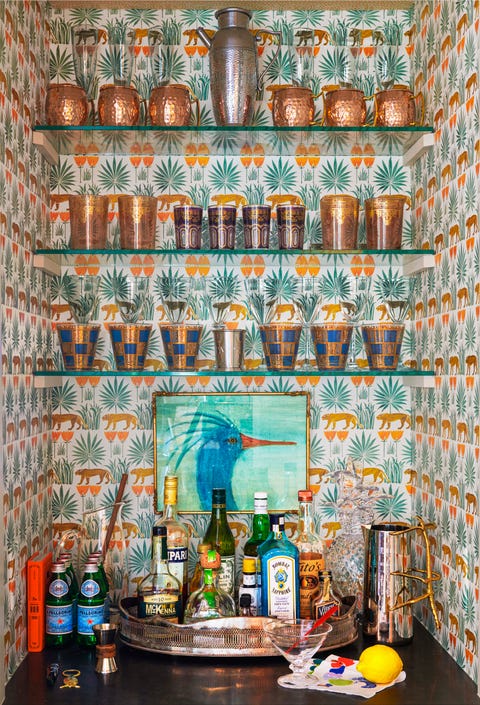 Wall, Turquoise, Room, Interior design, Wallpaper, Furniture, Textile, Architecture, Glass bottle, Mosaic, 