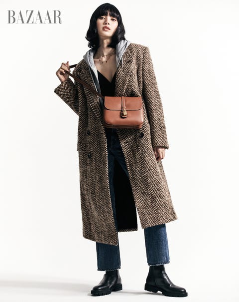 Lisa from Blackpink starts her solo career lisa from blackpink wears a celine coat and jeans for harpers bazaar
