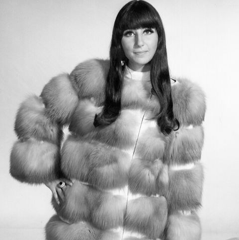circa 1966  entertainer cher poses for a portrait wearing a fur coat in circa 1966 photo by michael ochs archivesgetty images