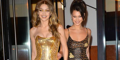 Gigi Hadid S 23rd Birthday Outfit Included A Gold Versace Dress And Sweats