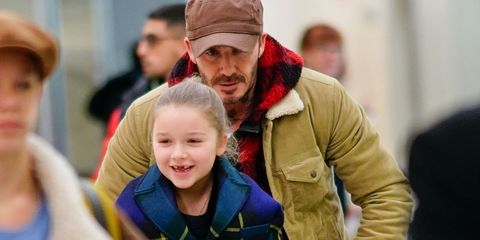 Harper Beckham had the best transport at the airport thanks to dad David Beckham as they arrived in NYC