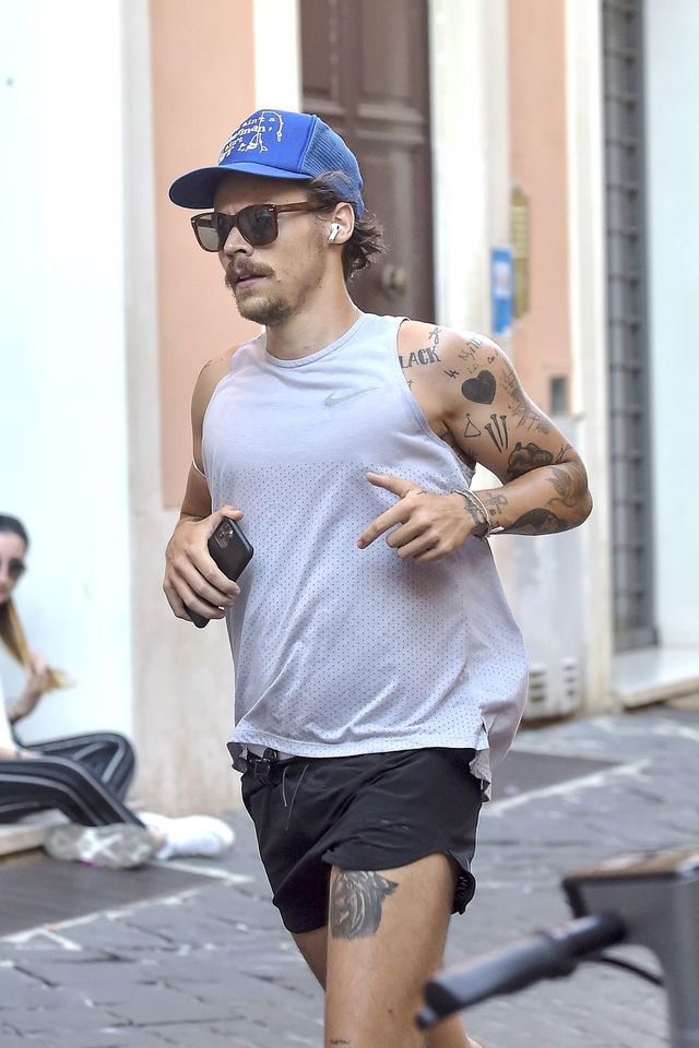 exclusive no web until 2330 bst 1st aug harry styles sports new facial hair while jogging in rome 24 jul 2020 pictured harry styles photo credit mega themegaagencycom 1 888 505 6342 mega agency tagid mega690650002jpg photo via mega agency